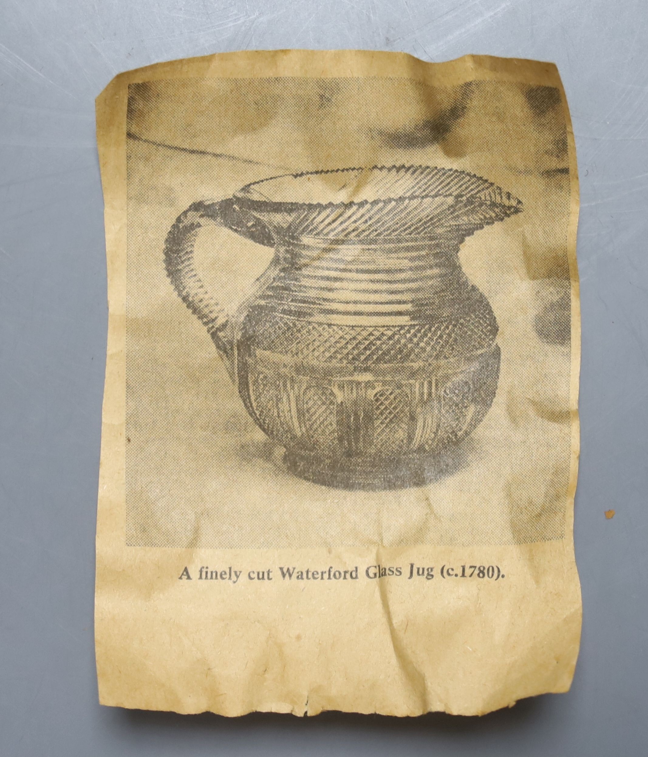 A Regency Irish Waterford crystal jug 16cm, crack to base of handle